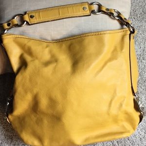 Sunny yellow gold handbag